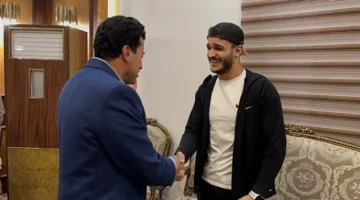 وزير الرياضة يكرم البطل مصطفى حسين بعد حل أزمة التجنيس